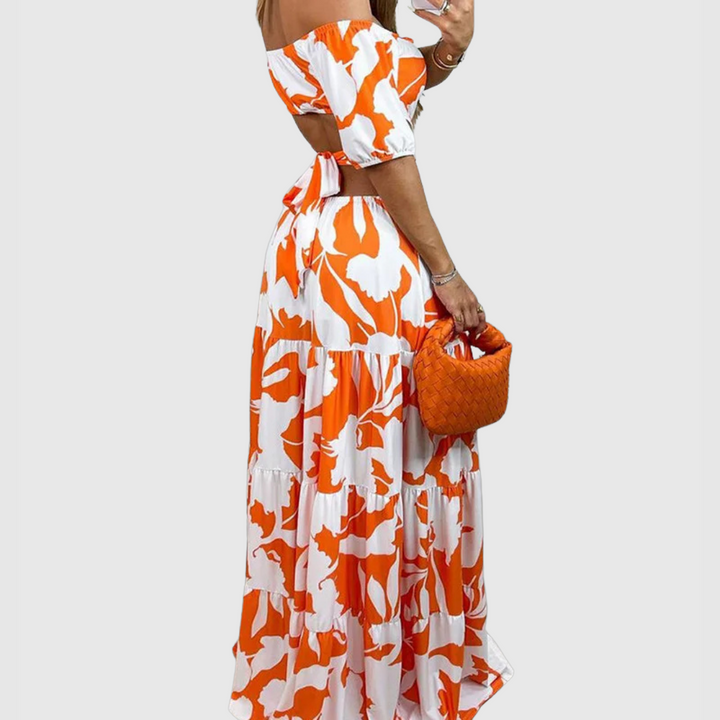 Arden - Élégante robe midi à découpes en tissu à texture irrégulière