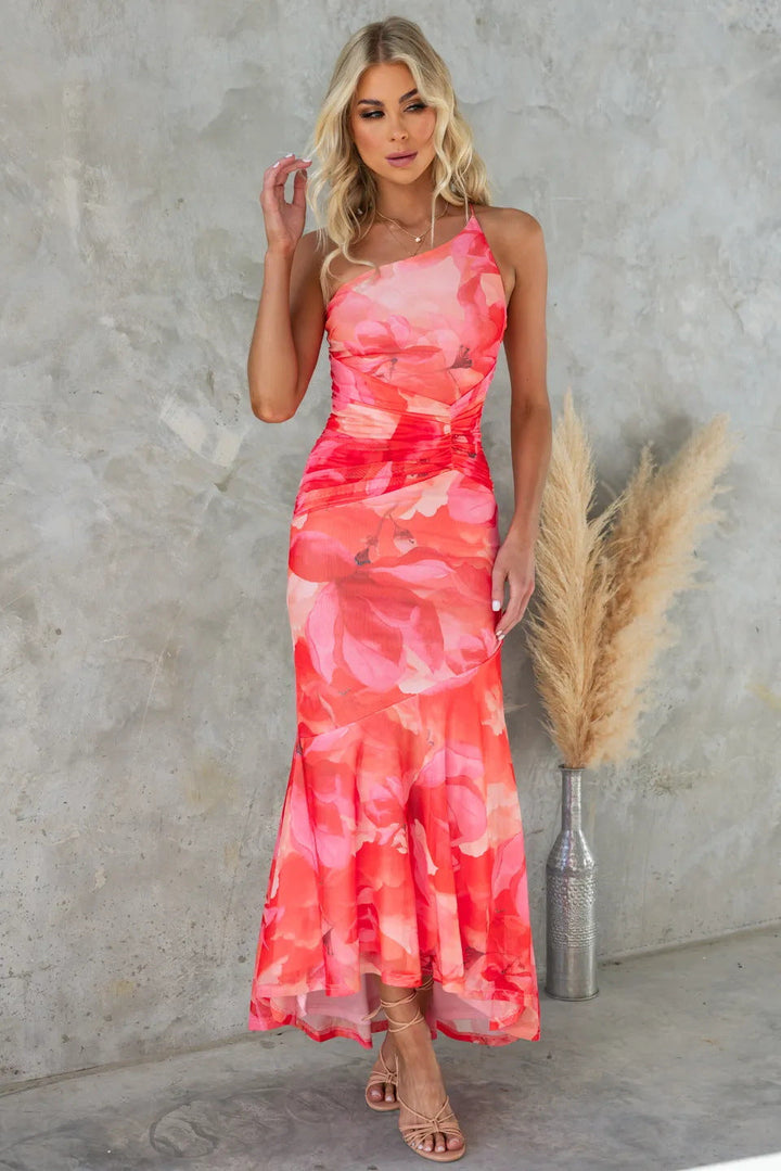 Nyla - Robe de soirée à ourlet asymétrique avec motif floral