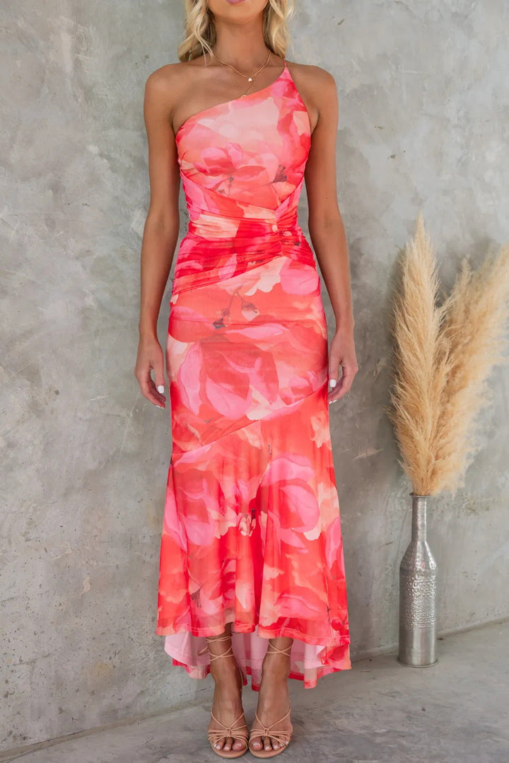 Nyla - Robe de soirée à ourlet asymétrique avec motif floral
